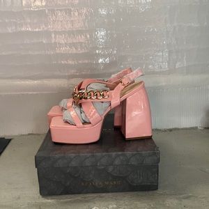 Azalea Wang “NOT GOING HOME CHUNKY SANDAL” in size 11, color black.